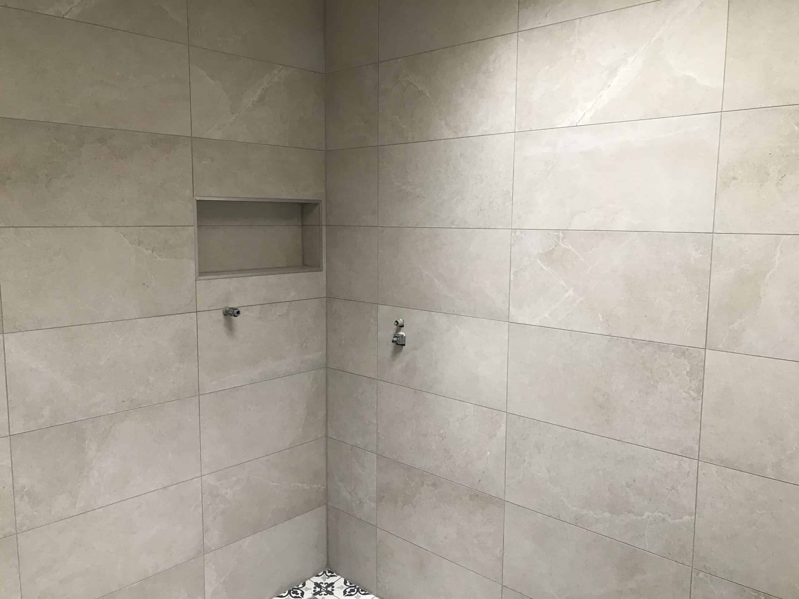 Shower tiles with grey grout